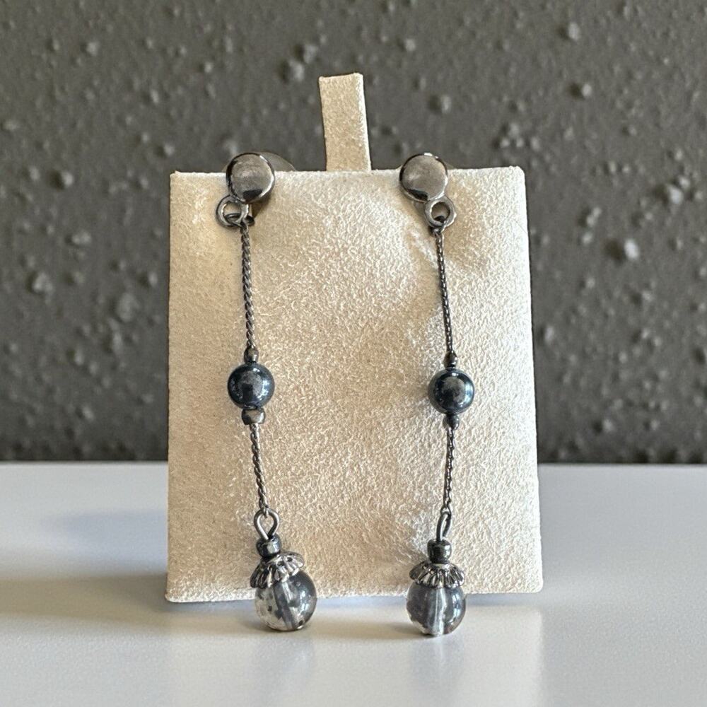 Long chain drop Pierced earrings small black beads and clear quartz-like beads